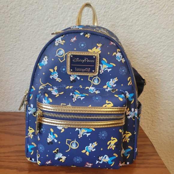 Loungefly Handbags - WDW Parks 50th Loungefly Mini Backpack Ears Holder Disney World Used Once